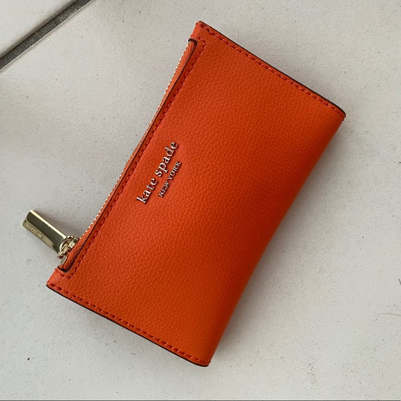 kate spade sylvia small slim bifold wallet